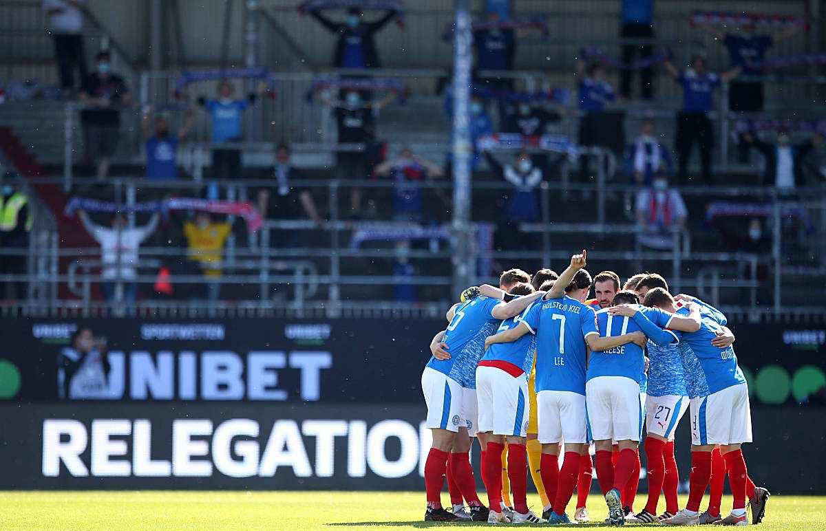 爱游戏体育下载-升降级球队对决！比勒菲尔德力争胜利，荷尔斯泰因基尔追赶尾声！